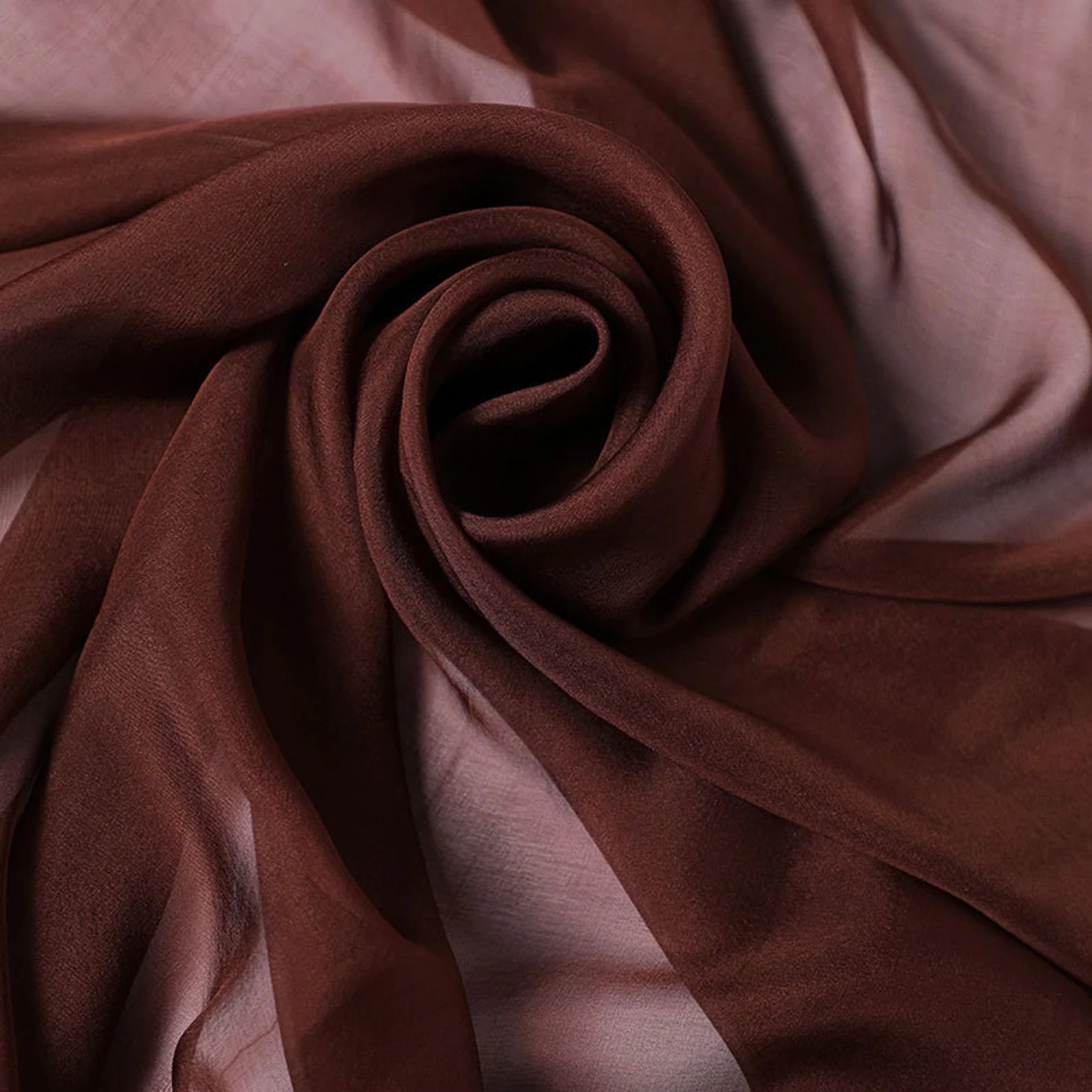 Brown silk scarf fabric detail with soft folds